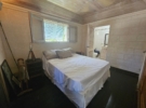 Cottage master bedroom and bathroom