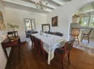 Main house dining room with room to studio-office