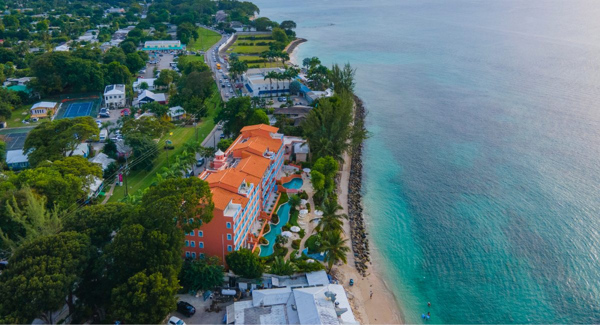 Aerial view of Holetown in St. James Parish Barbados on the West Coast showing beachfront properties and coastal communities near healthcare facilities used by expats