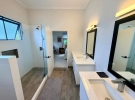 14One Shermans Barbados for sale_primary bathroom shower and double vanity