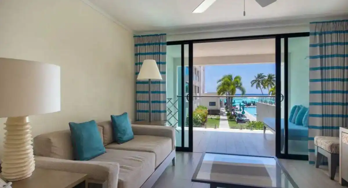Interior of a Sands condo showing contemporary finishes and ocean-view balcony