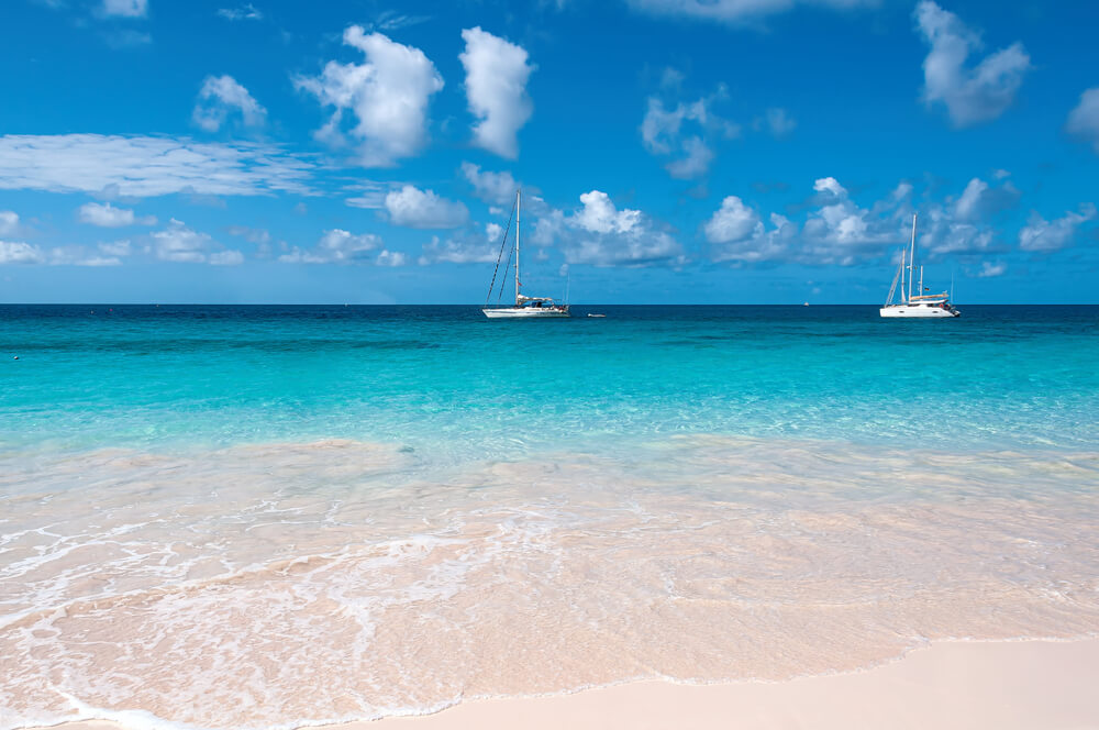Beach St James Catamarans off the beach in St James