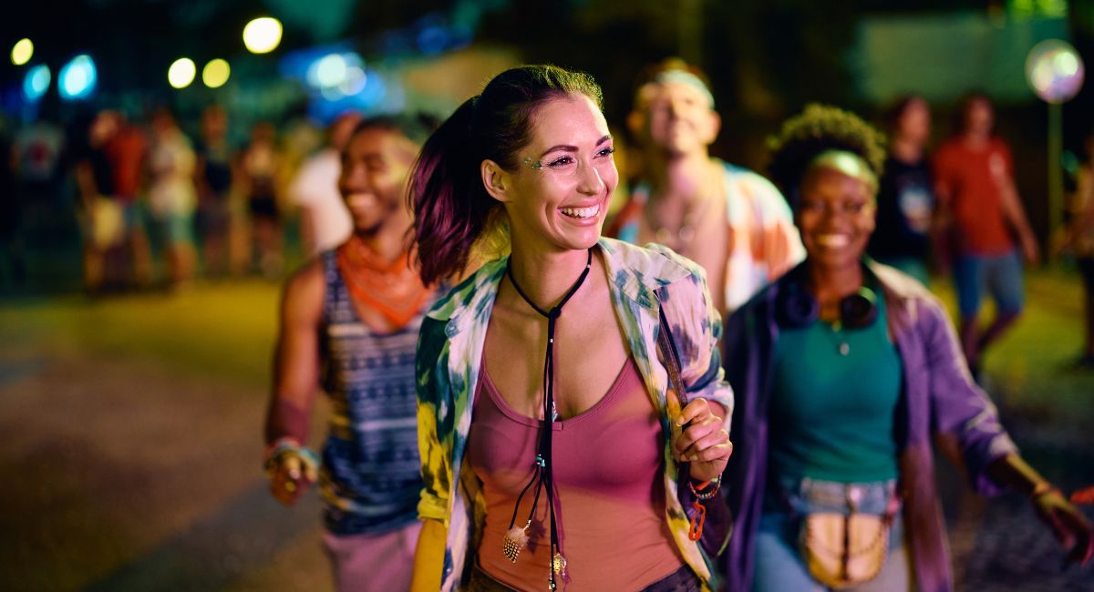 New Year's Eve jump-up street party on St Lawrence Gap, Barbados, with revellers dancing under string lights